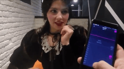 Cute Amish Girl Enjoys Modern Technology In Public